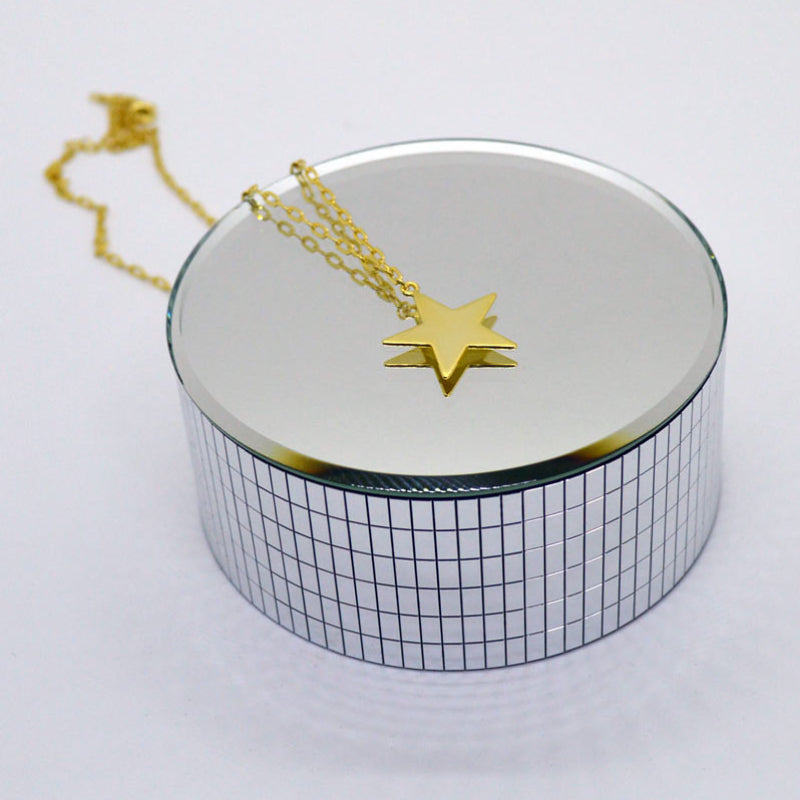 Dije con Cadena Estrella plata